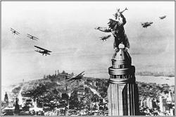 King Kong takes in the sights of the city from atop the Empire State Building.